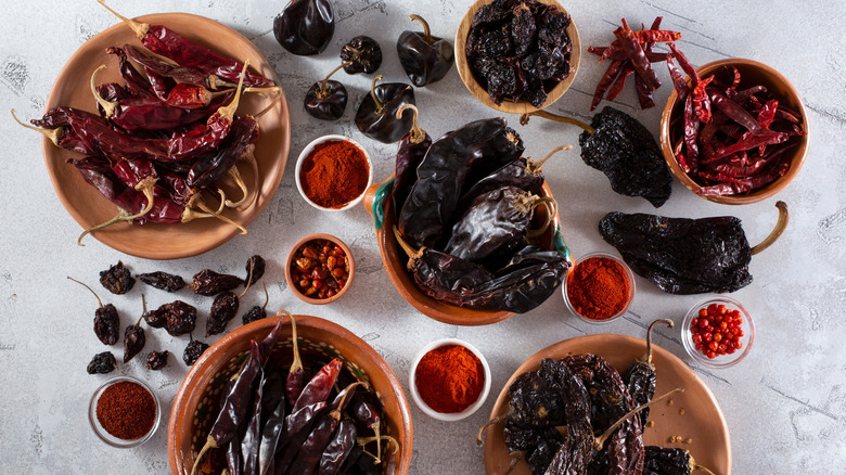 dried chile peppers and powders