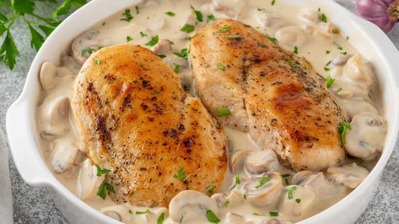 Chicken breasts with mushrooms in cream sauce