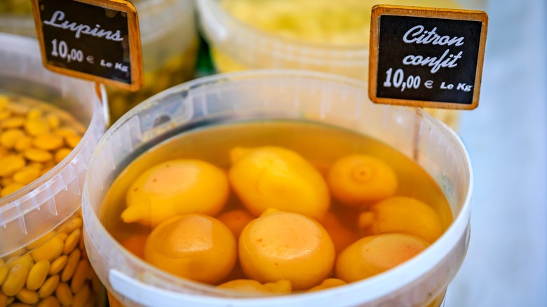 lemon confit in a bucket at farmer's market