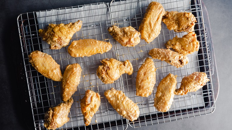 fried chicken wings on wire rack