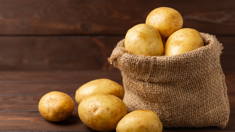 A sack of yellow potatoes