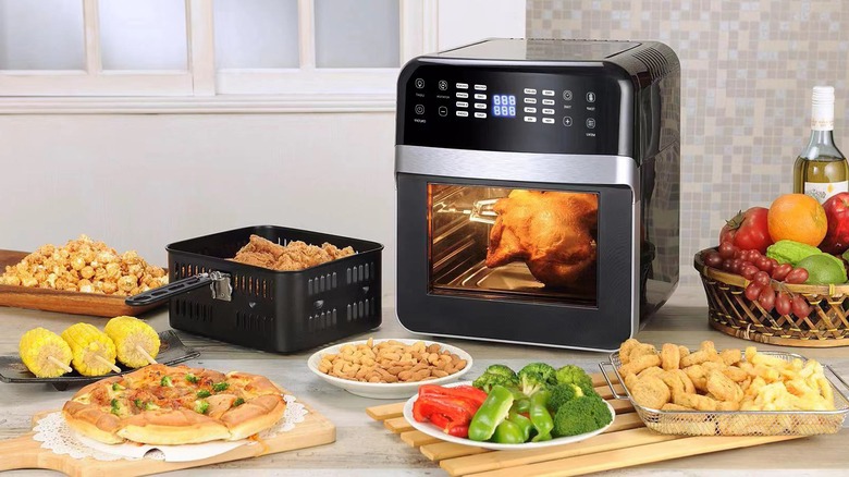 An air fryer with chicken inside