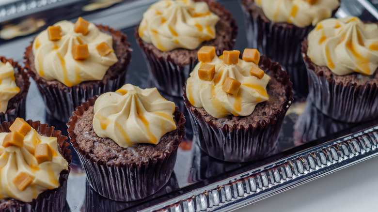 Salted caramel cupcakes made with Baileys frosting and caramel drizzle