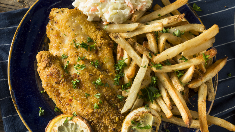 Cajun catfish with fries, slaw, and lemon