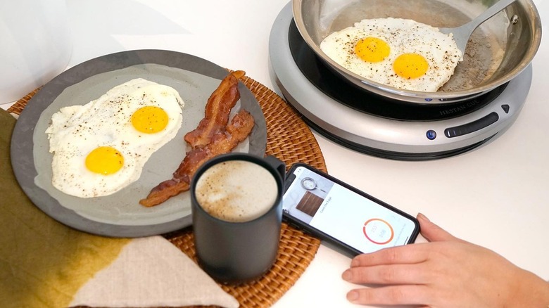 Ember mug with phone and breakfast