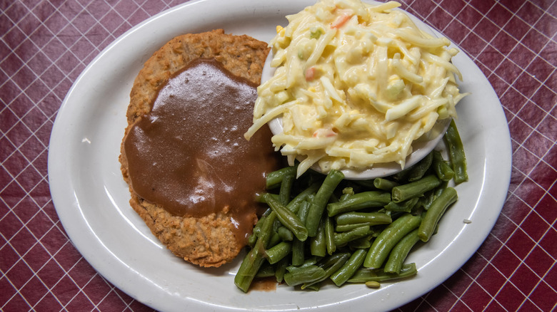 Country-fried steak with green beans and cole slaw