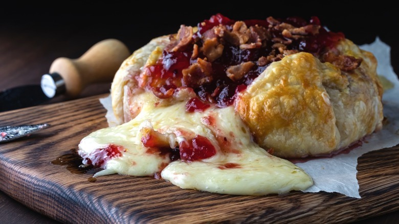 Brie in puff pastry with cranberries and walnuts