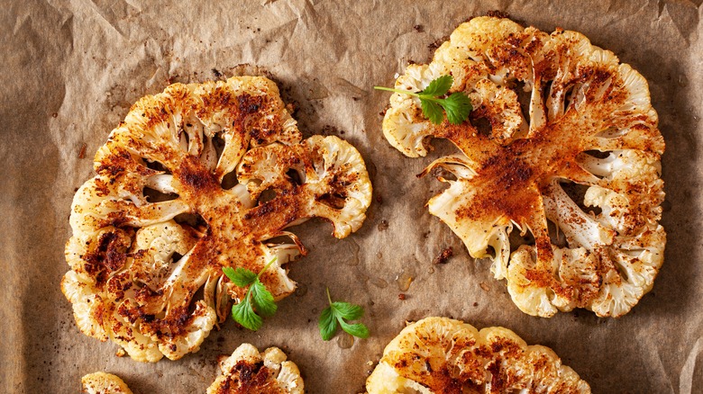 roast cauliflowers with spices sprinkled on surface