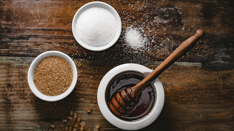 sugars and honey in bowls