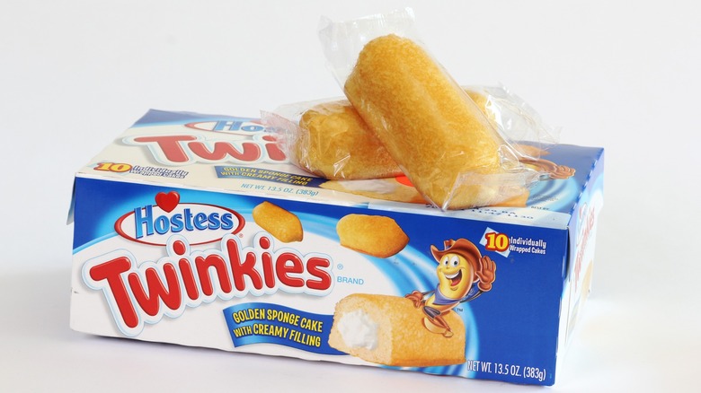Packaged Hostess Twinkies on box with mascot Twinkie The Kid