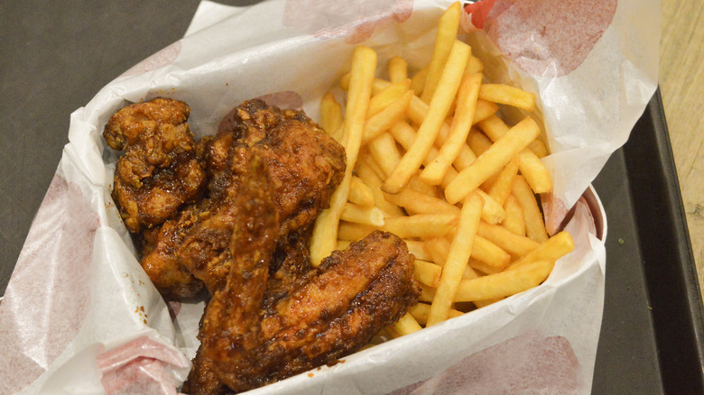 Order of chicken wings and french fries