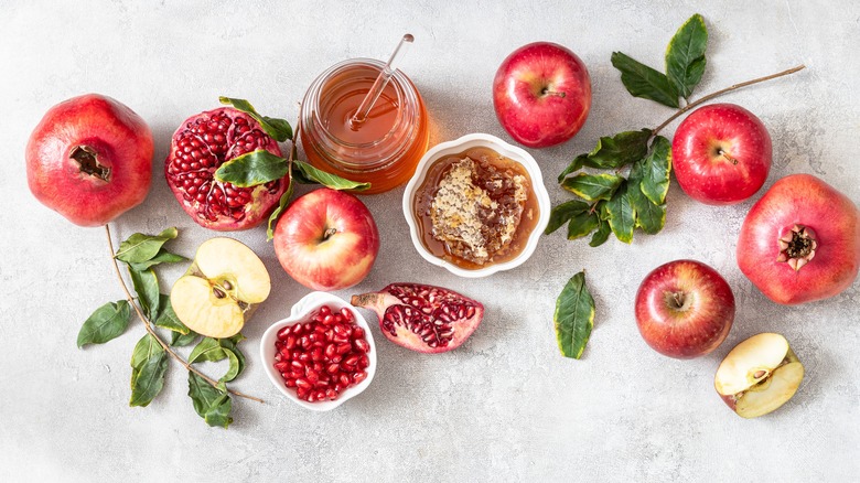 Rosh Hashanah honey, pomegranates, and apples