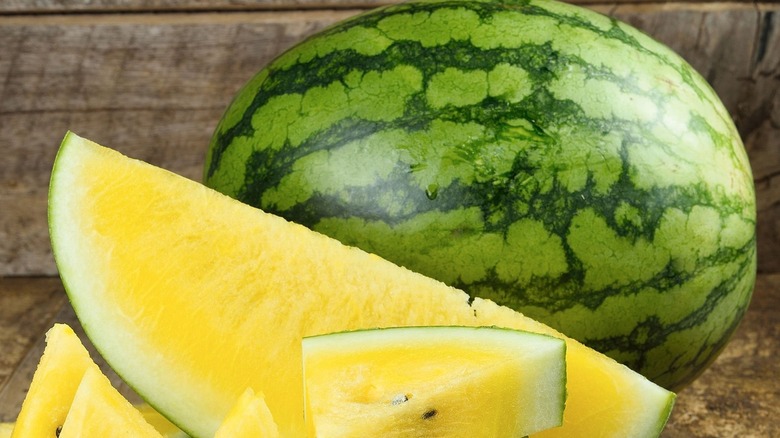 Yellow watermelon on table