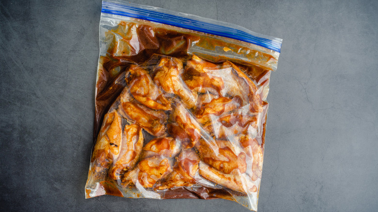 Bag of marinating chicken wings