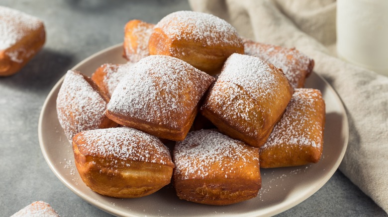 beignets dusted with powdered sugar