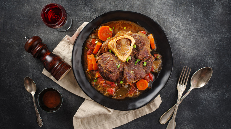 dish of osso bucco with red wine