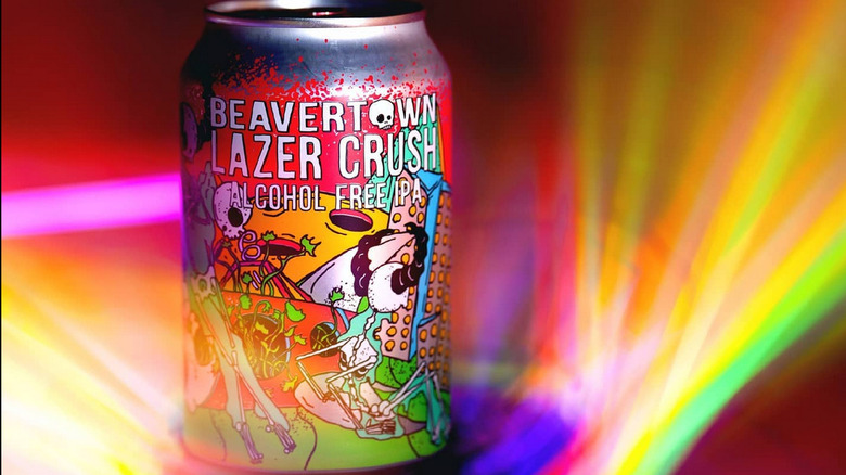 a can of lazer crush on a multicolored background