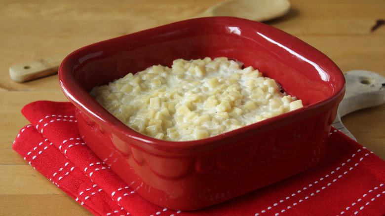 Square crozets pasta in red square dish