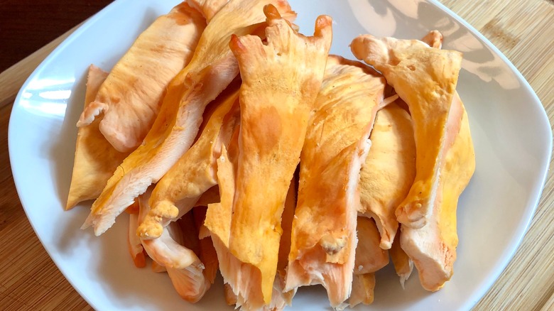 Chicken of the woods on white plate