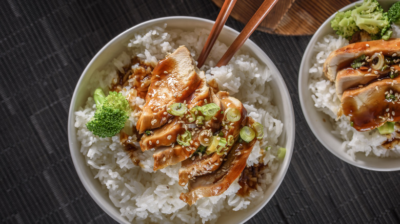 teriyaki chicken rice bowl with broccoli and scallions