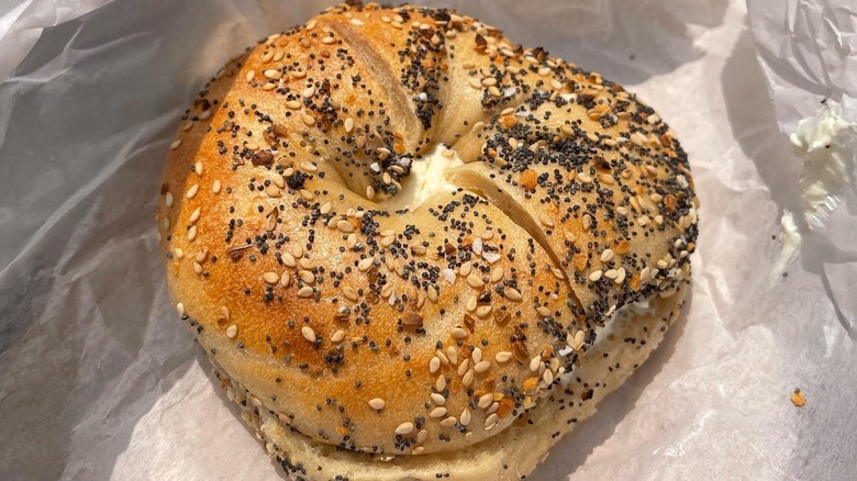 Everything bagel on crinkled paper