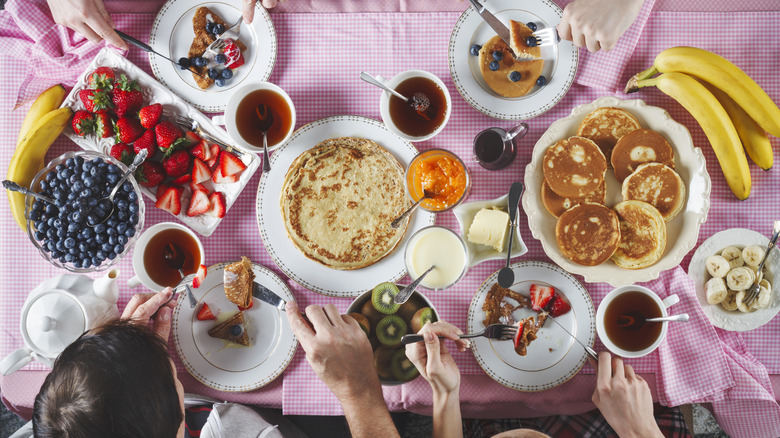 Breakfast spread with various sauces and condiments