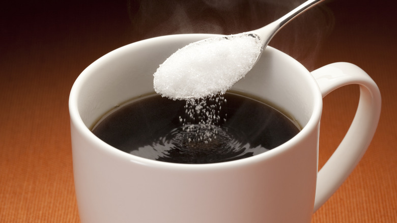 Coffee with a spoon of sugar