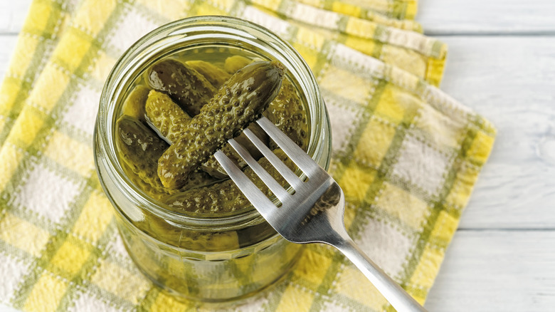 Fork in dill pickle jar