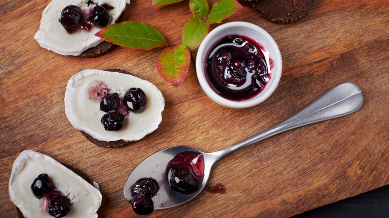 goat cheese and blueberry jam on toasts