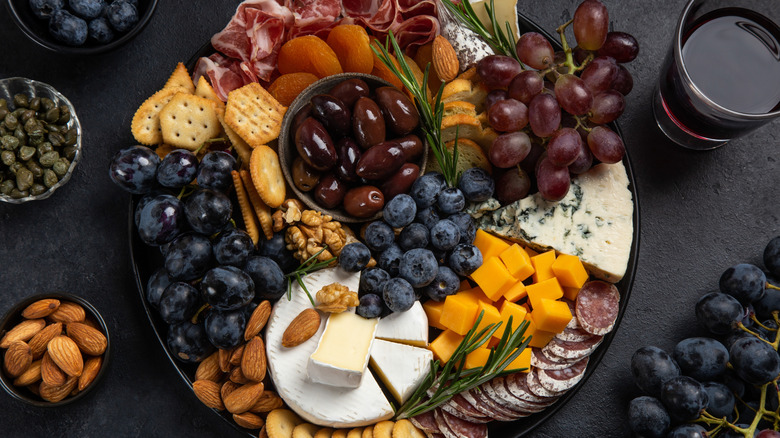 blueberries and cheddar on a classic cheese board