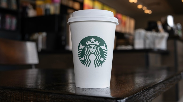 Starbucks cup on table