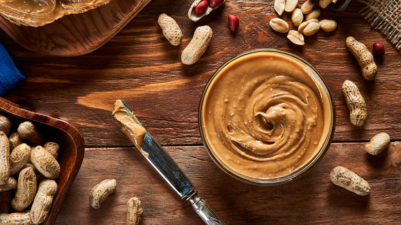 peanut butter spread on knife