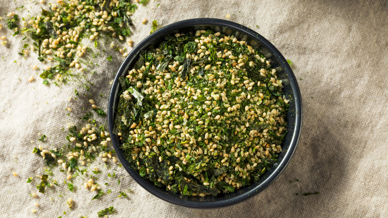 Bowl of dried furikake on a cloth background