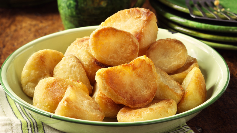 Crispy, oven roasted potatoes in a bowl