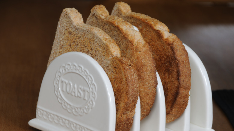 Slices of toast in ceramic toast rack