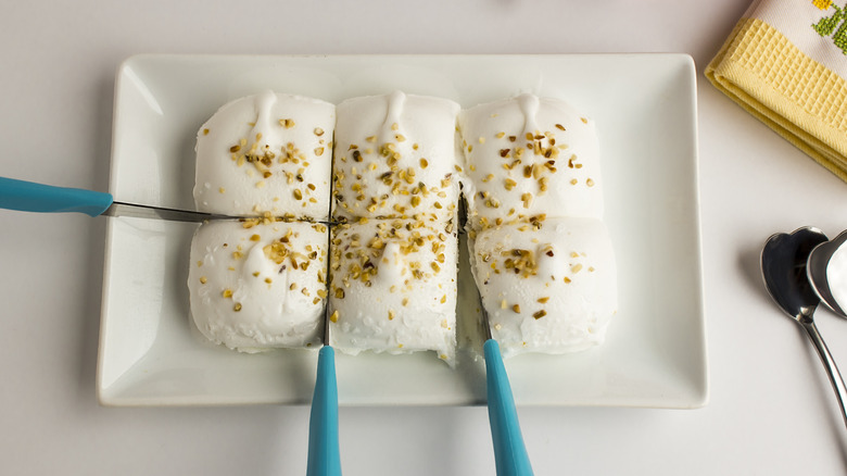 cutting ice cream with knife