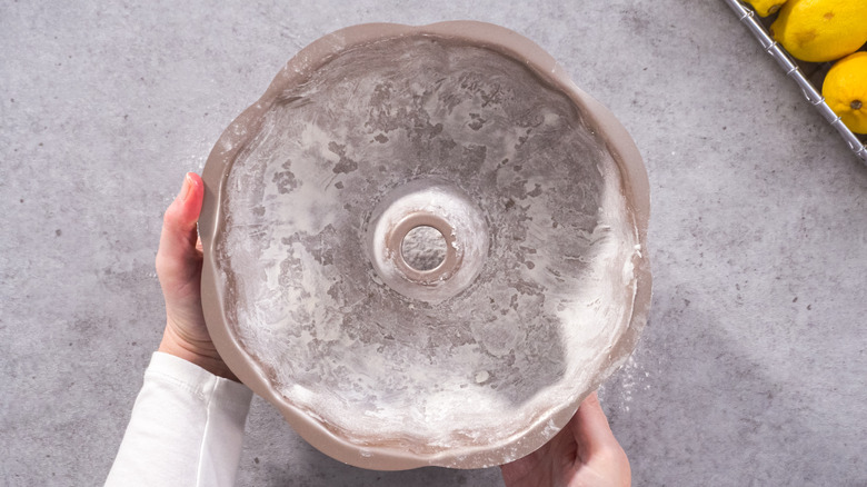 Greased and floured bundt cake pan