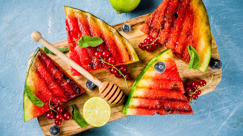 Grilled watermelon slices with limes