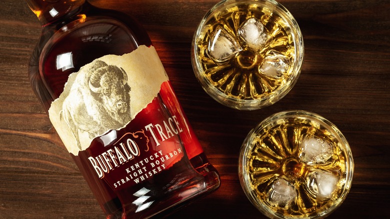 Bottle and glasses of Buffalo Trace bourbon whiskey 