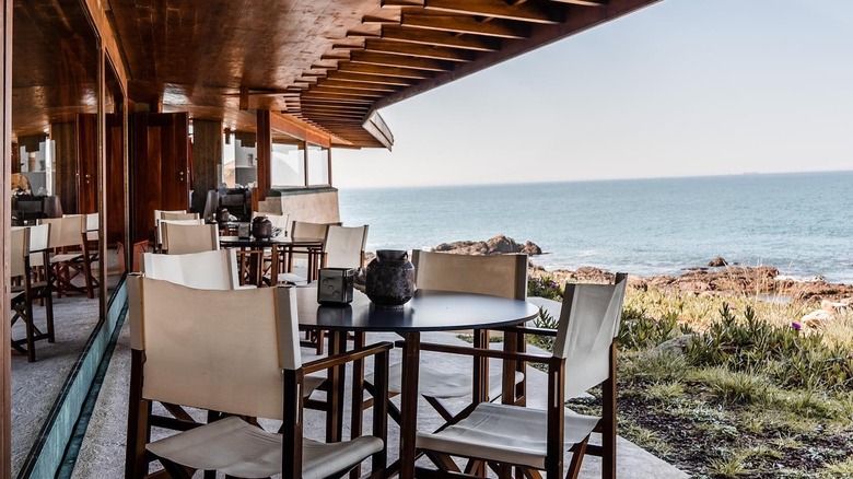 restaurant seating by ocean