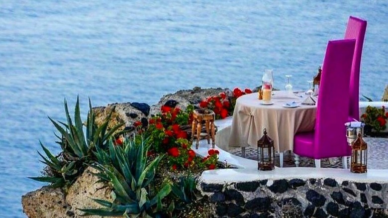 table for two on a cliff