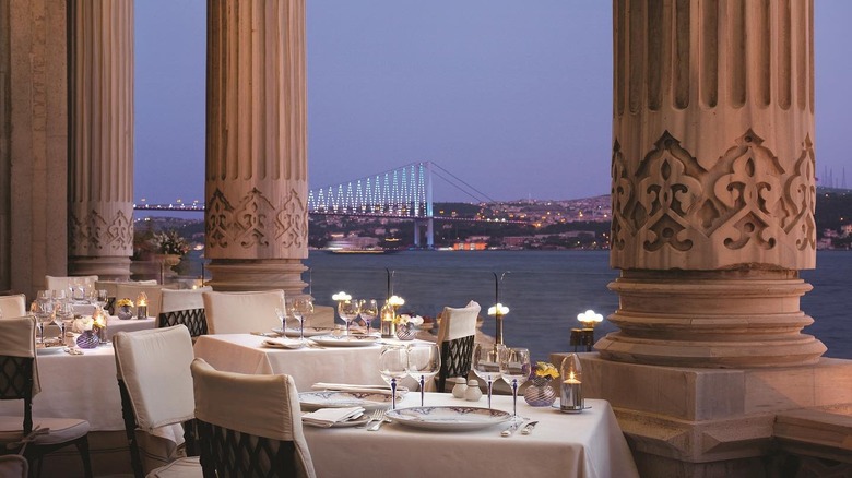 table settings at restaurant along river