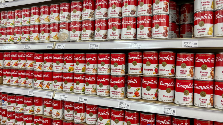 grocery aisle wall of Campbell's soup cans