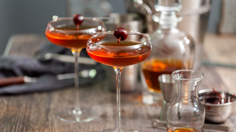Manhattan cocktails with cherry garnishes