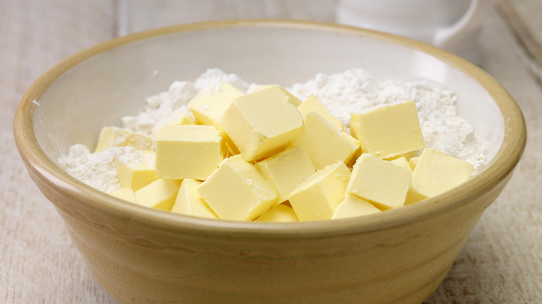 butter cubes in flour