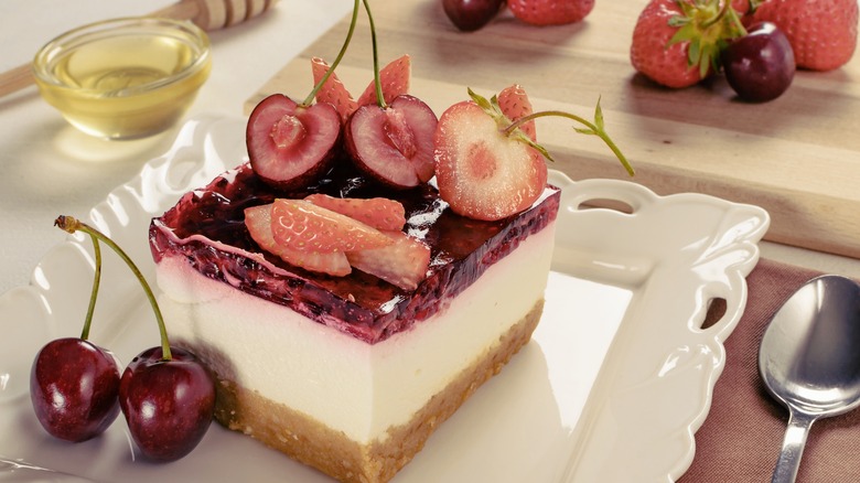 Cherry cheesecake on white plate