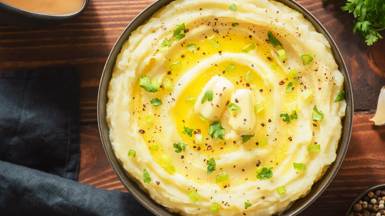 Mashed potatoes topped with butter