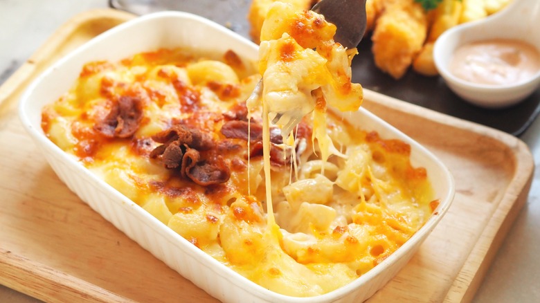 Macaroni cheese in white bowl