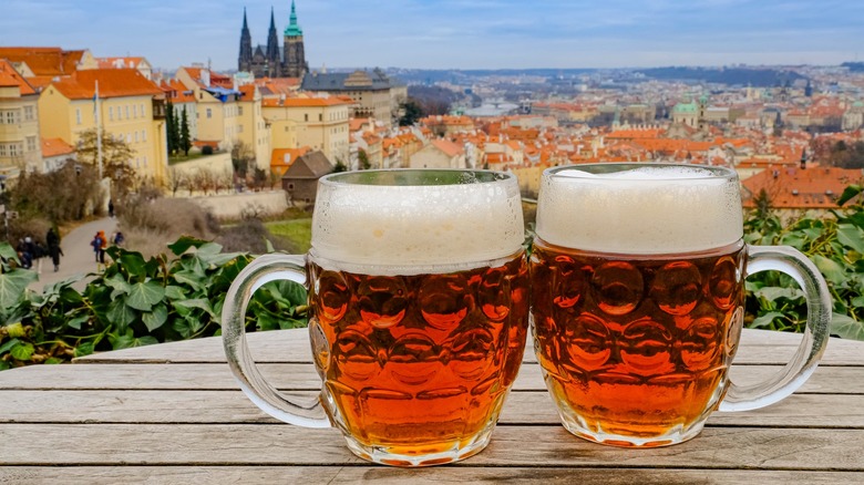 Two mugs of beer in Prague