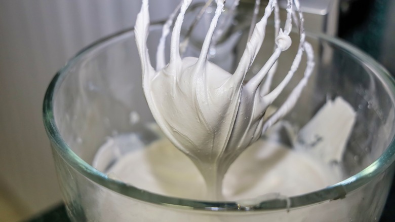 Mixing royal icing with whisk